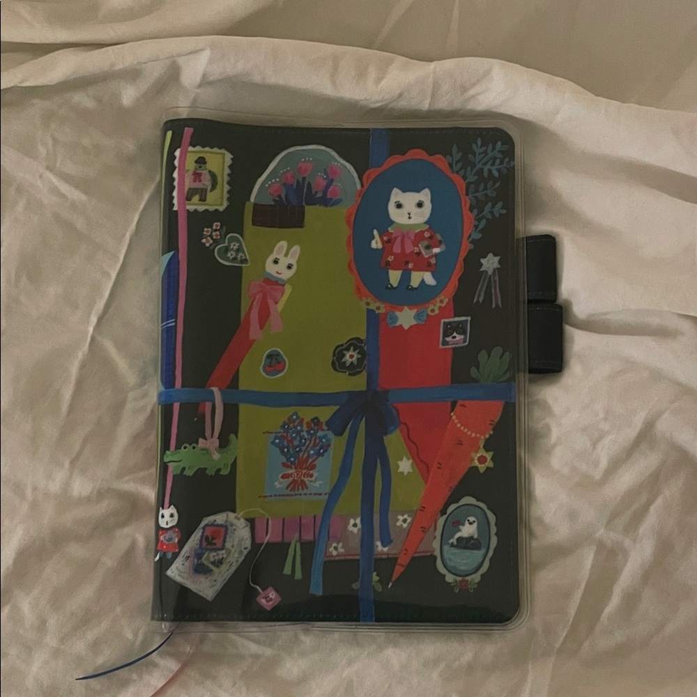 hobonichi A5 yumi kitagishi cover (with cover on cover)